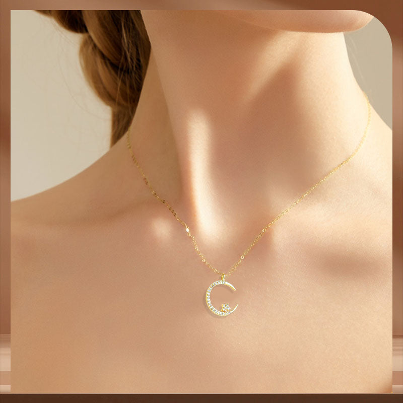 Collar con colgante de luna y estrella