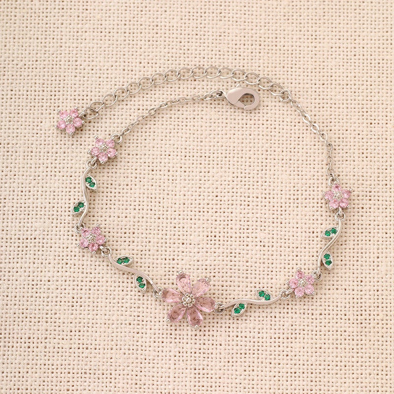 Elegante pulsera con flores