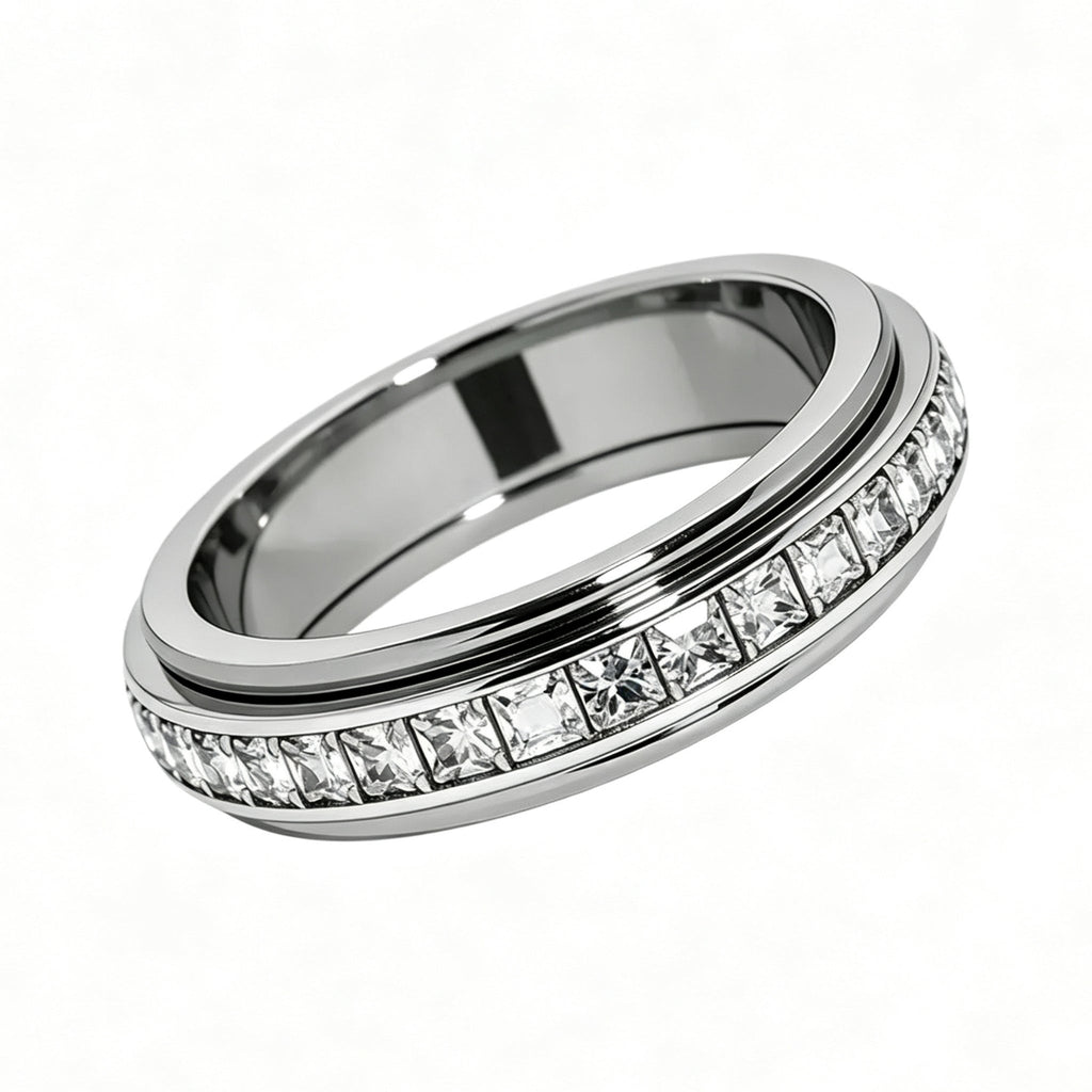 SPINORE | ANILLO FIDGET GIRATORIO DE ACERO TITANIO