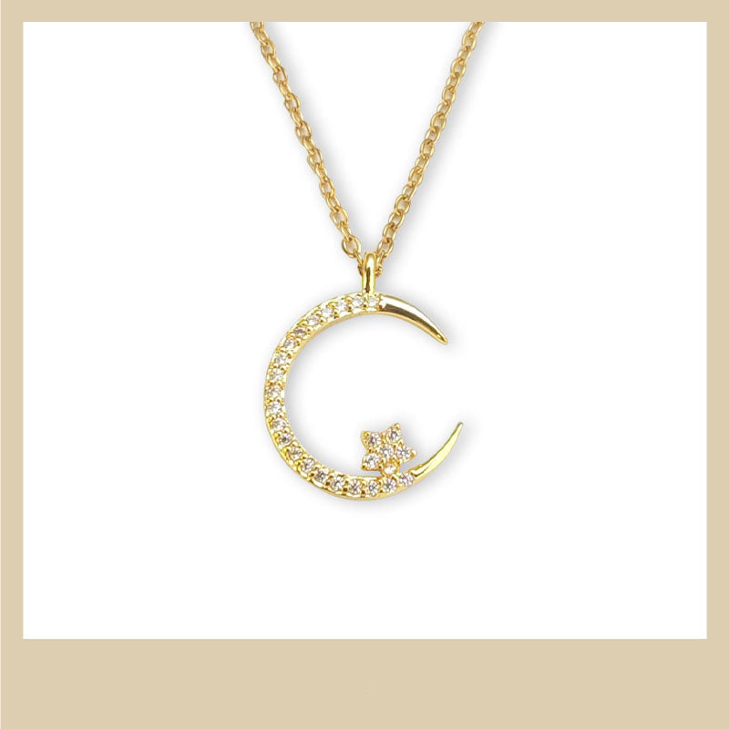 Collar con colgante de luna y estrella