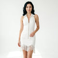 Vestido mini con cremallera y flecos