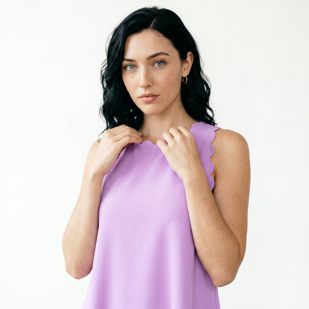 Vestido elegante con dobladillo ondulado