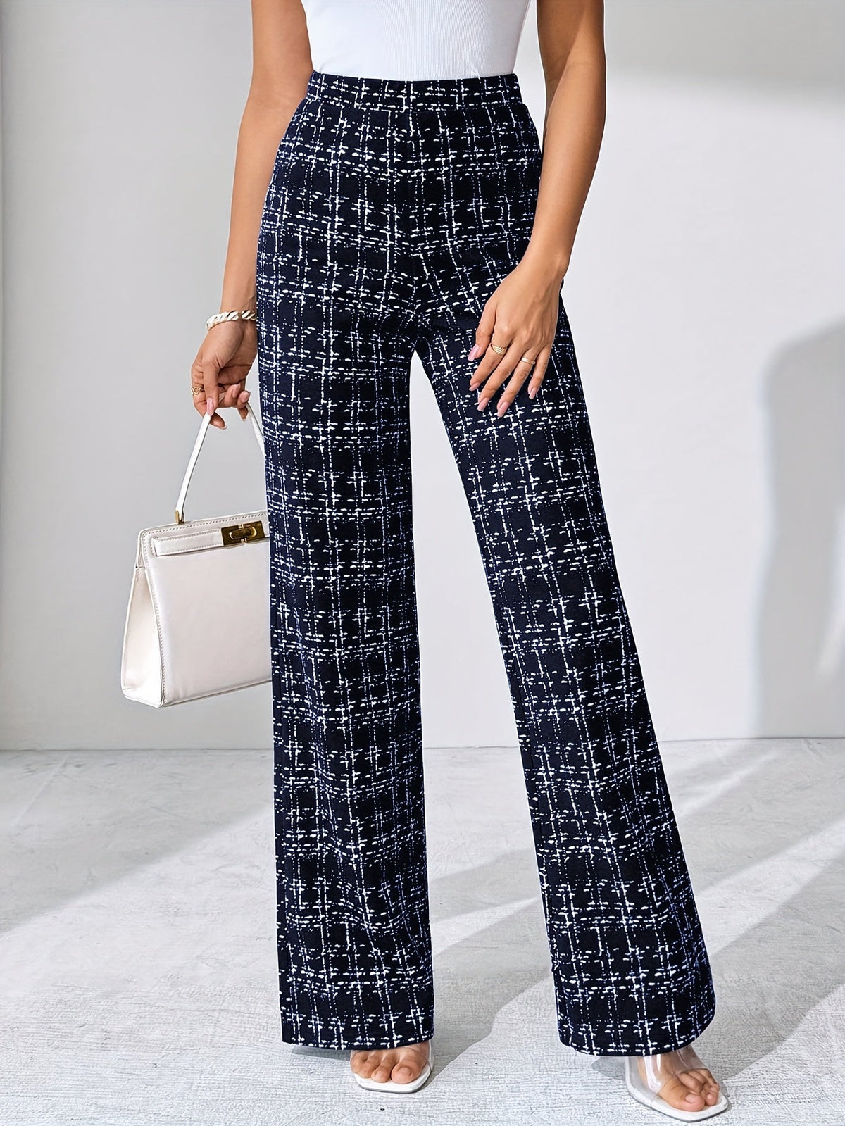 EVASELLE | PANTALON ACAMPANADO DE TWEED A CUADROS