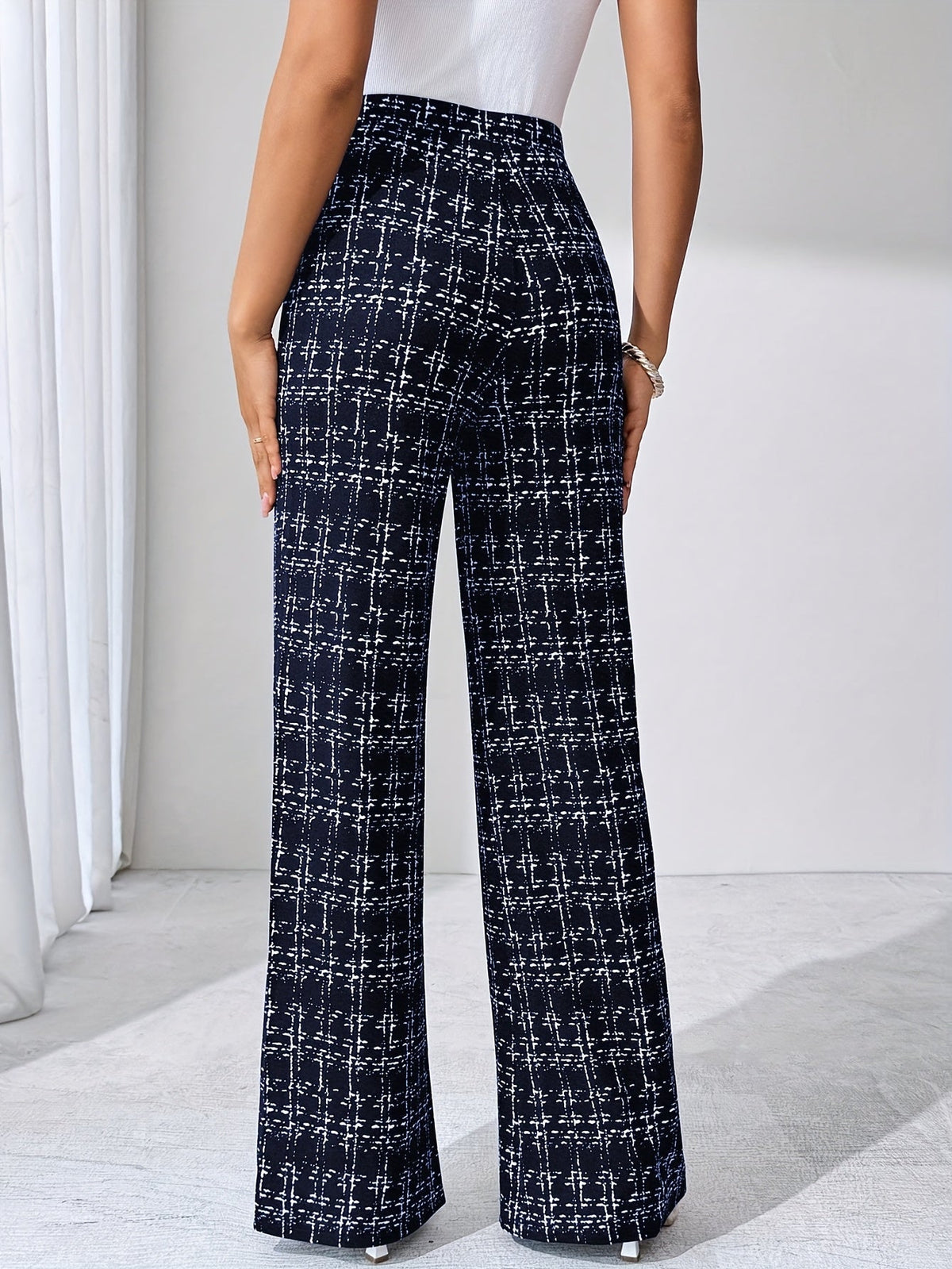 EVASELLE | PANTALON ACAMPANADO DE TWEED A CUADROS
