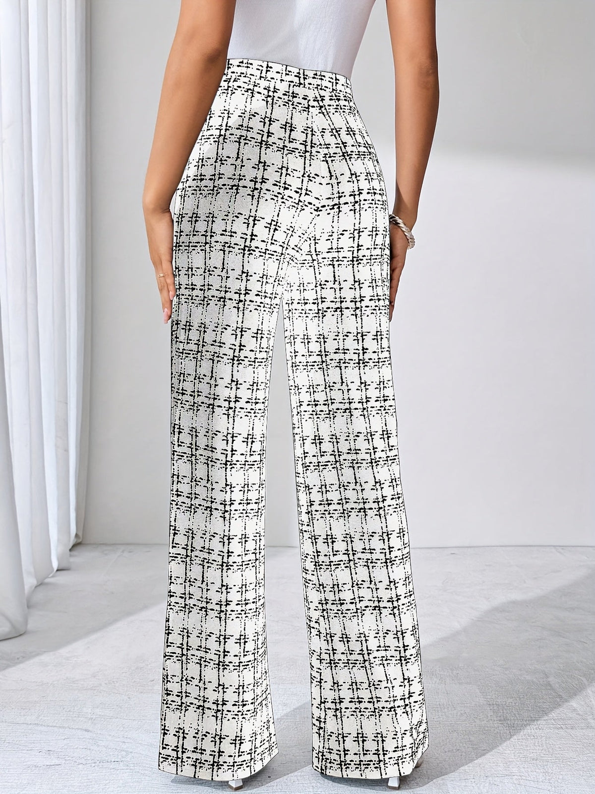 EVASELLE | PANTALON ACAMPANADO DE TWEED A CUADROS